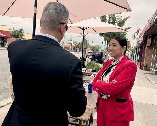 Mandip meeting with locals at the Palm Coffee Bar