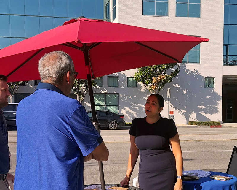 Mandip meeting people at Priscilla's Coffee