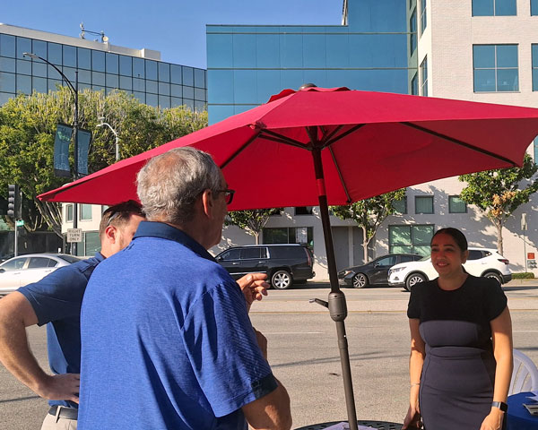 Mandip meeting people at Priscilla's Coffee